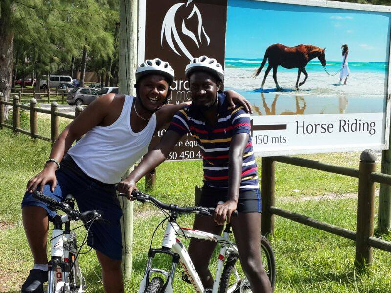 Rwakakamaba on a riding break with Jubilee's Lenson Njogu during SOAS Mo Ibrahim in Mauritius.